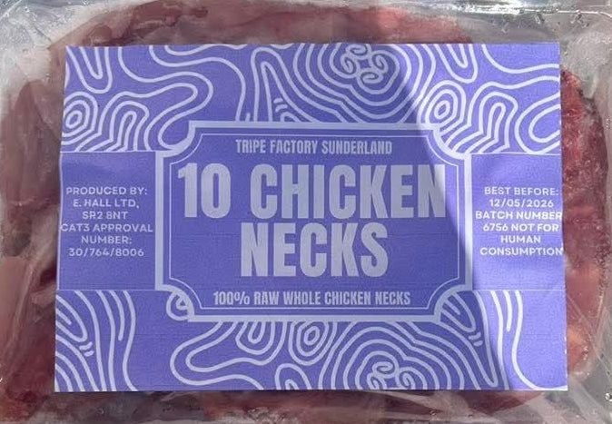Hand holding packaged 10 chicken necks raw frozen pet treats labeled Tripe Factory Sunderland
